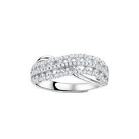 Sterling silver crossover ring with pavé-set moissanite stones creating an elegant infinity design on neutral background