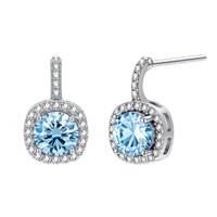 Sterling silver drop earrings featuring cushion-cut blue moissanite stones surrounded by sparkling halo settings