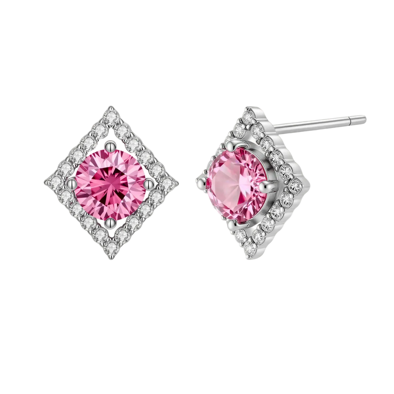 Sterling silver diamond-shaped stud earrings with pink moissanite center stones and crystal halo setting on white background