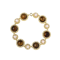 Gold-plated link bracelet with alternating brown tiger's eye stones and white freshwater pearls in ornate bezels.