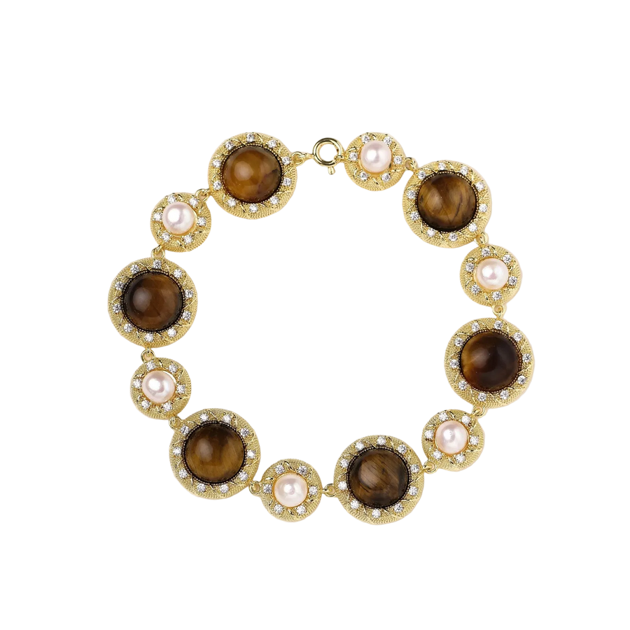 Gold-plated link bracelet with alternating brown tiger's eye stones and white freshwater pearls in ornate bezels.