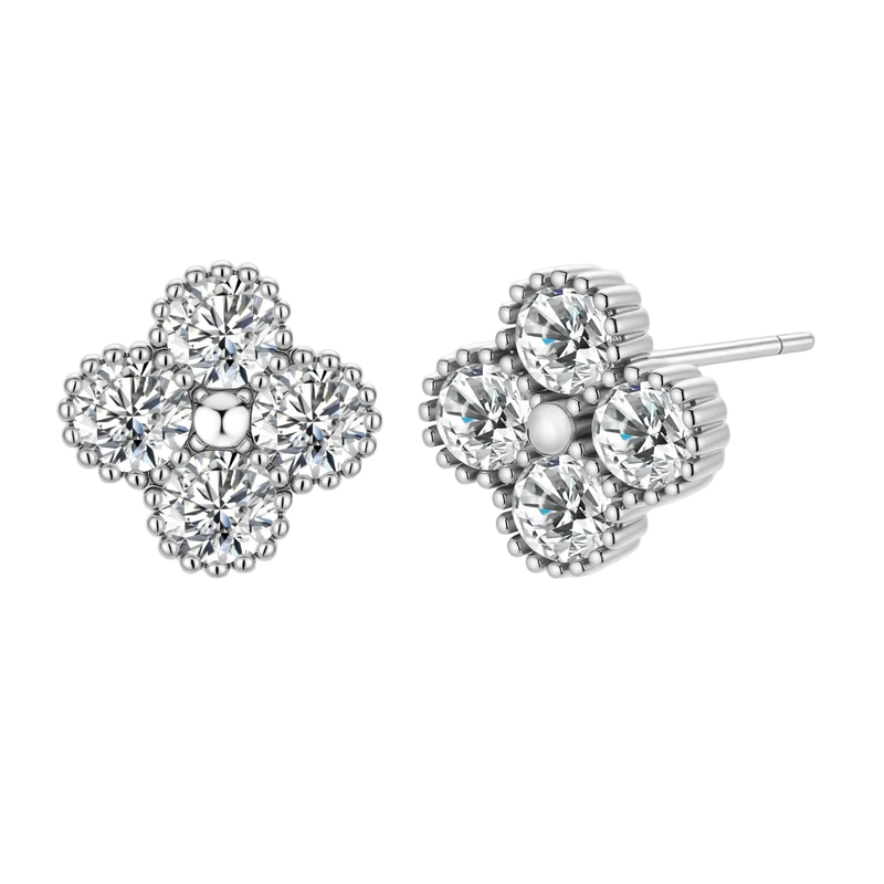 Dainty sterling silver quatrefoil stud earrings with four brilliant moissanite stones and center accent on white background.