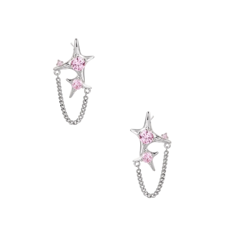 Pair of silver star-shaped ear climbers with pink zirconia stones connected by delicate chains
