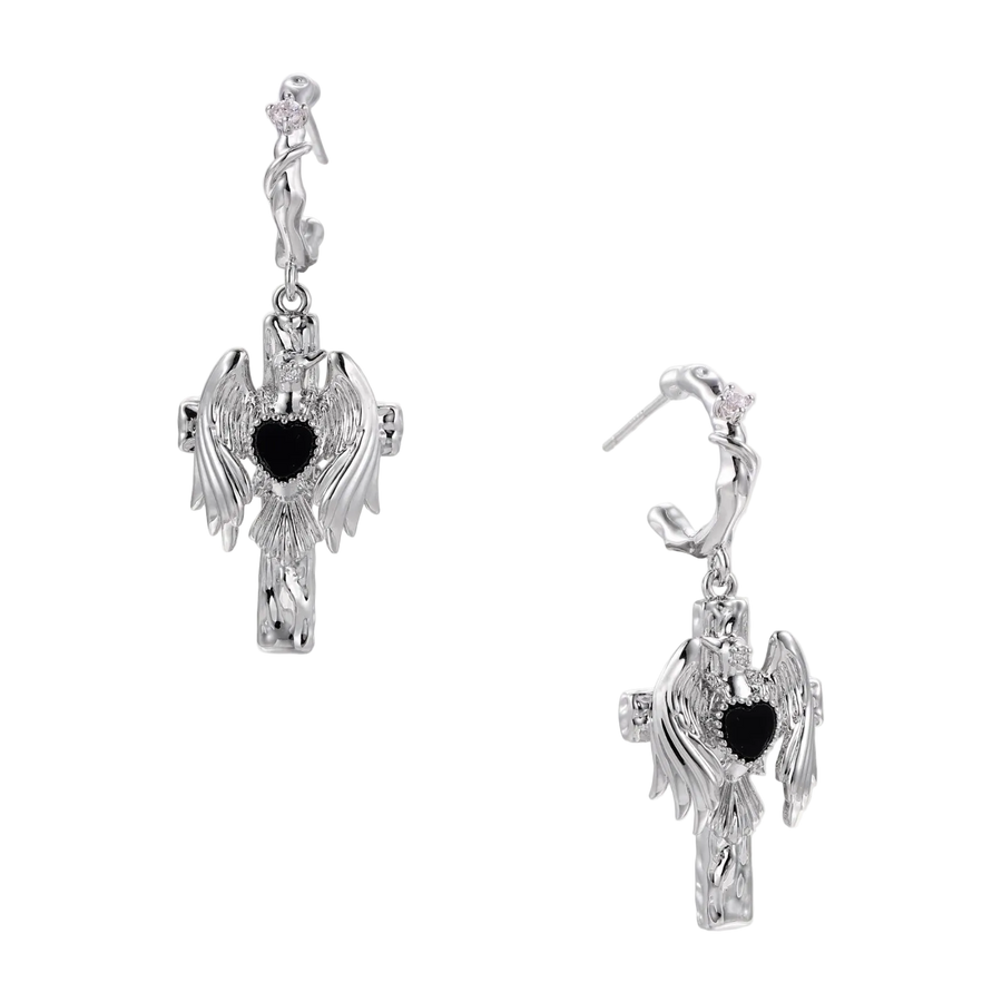 Silver-toned drop earrings with angel wings framing a black heart-shaped stone, white gold plated brass with S925 posts