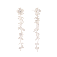 Long sterling silver drop earrings with delicate floral vine design and crystal accents on white background