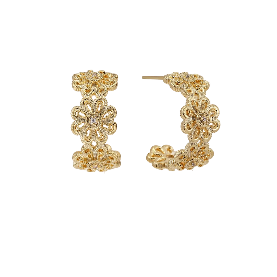 Gold hoop earrings with intricate three-dimensional floral filigree pattern in 14K gold plated brass on cream background
