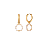 Gold-plated huggie hoop earrings with CZ-studded open circle charms on beige background