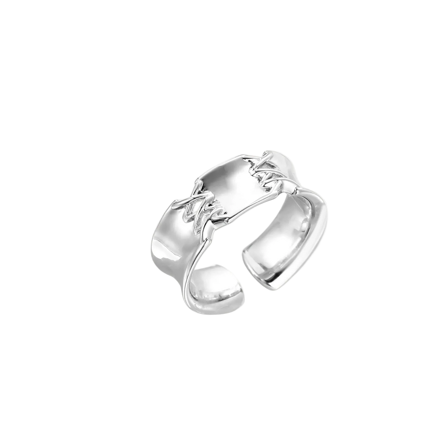 Adjustable silver-toned ring with sculptural stitch design across polished white gold-plated brass band