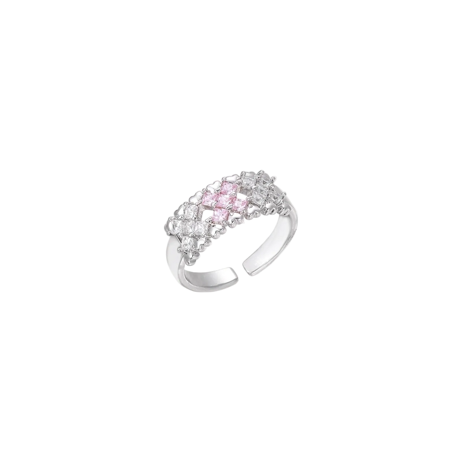 Close-up of an adjustable white gold plated ring featuring a cluster of square-cut clear and pink zirconia stones in geometric arrangement.