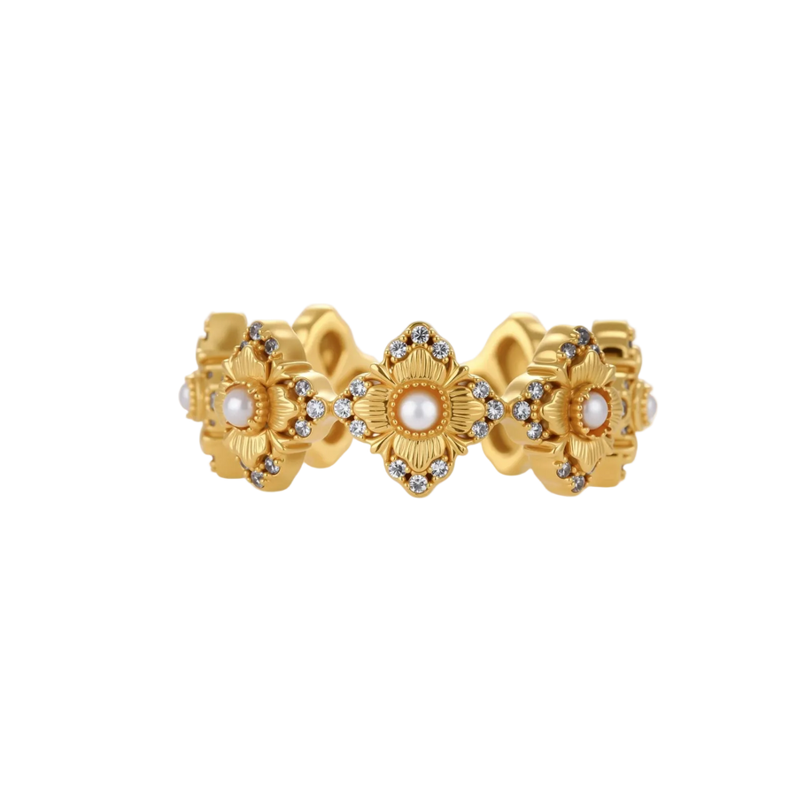 Gold-plated adjustable ring with multiple flower motifs, each featuring a central pearl and cubic zirconia stones