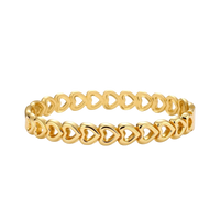Gold 18K plated stainless steel bangle with continuous open heart links, high-polish finish, on white background.